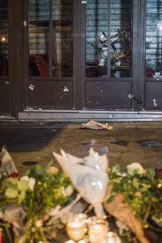 FRANCE, Paris: Crowds gathered in Paris to remember the dead and leave flowers and tributes for the attack victims on November 14, 2015. 
