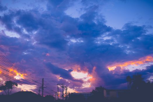 The silhouette of the city skyline during sunset, expressive sky, nature background