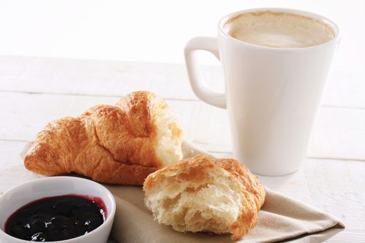 fresh baked croissant with coffee