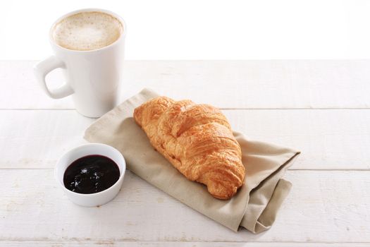 fresh baked croissant with coffee