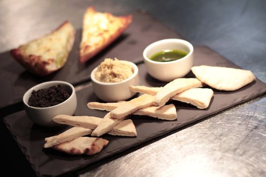 garlic bread and hummus dip appetizer