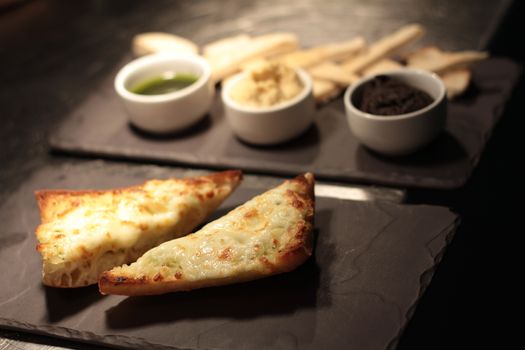 garlic bread and hummus dip appetizer