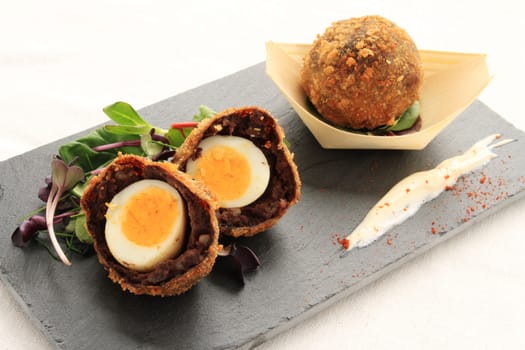 scotch egg plated starter appetizer