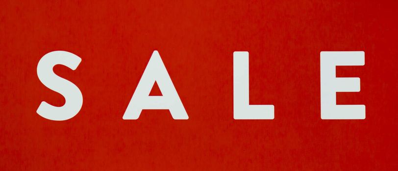 Sale Sign Close Up white and red.