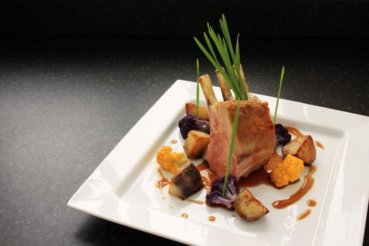 roast rack of lamb plated dinner