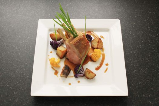 roast rack of lamb plated dinner