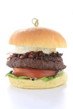 gourmet beefburger with goats cheese isolated