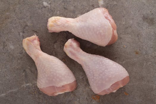 Raw chicken legs drumsticks