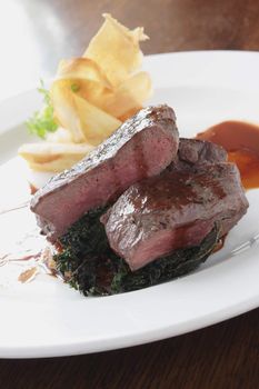 plated venison steak meal