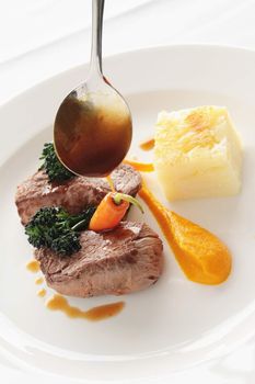 beef lamb steak plated meal