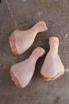 Raw chicken legs drumsticks