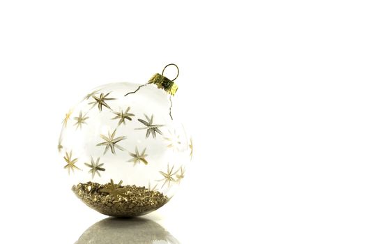 transparent christmas ball with golden stars