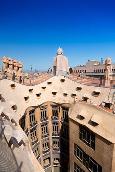 BARCELONA, SPAIN - JULY 19: Antoni Gaudi's work at the roof of Casa Mila on July 19, 2012 in Barcelona, Spain. Popularly known as La Pedrera, this modernist house was built between 1906 and 1910.