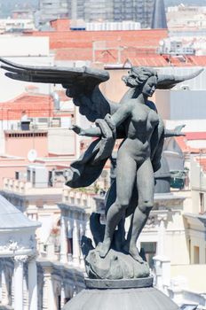 Angel sculpture on Metropolis building in Madrid, Spain
