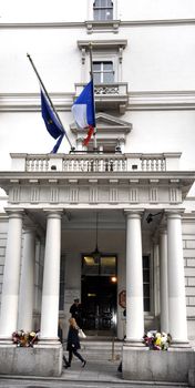 UNITED KINGDOM, London: Flowers and messages of support are left outside the French Embassy in London in the wake of the Paris terror attacks, as captured on November 16, 2015. In addition to leaving tributes, people across the UK also paused on Monday afternoon to join France in observing a minute's silence on the country's third day of national mourning.