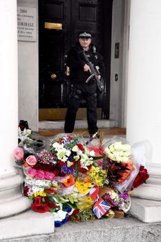 UNITED KINGDOM, London: Flowers and messages of support are left outside the French Embassy in London in the wake of the Paris terror attacks, as captured on November 16, 2015. In addition to leaving tributes, people across the UK also paused on Monday afternoon to join France in observing a minute's silence on the country's third day of national mourning.