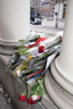 UNITED KINGDOM, London: Flowers and messages of support are left outside the French Embassy in London in the wake of the Paris terror attacks, as captured on November 16, 2015. In addition to leaving tributes, people across the UK also paused on Monday afternoon to join France in observing a minute's silence on the country's third day of national mourning.