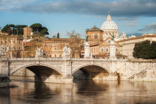 View of St. Peter's Basilica and bridges of Tiber river in Rome, Italy