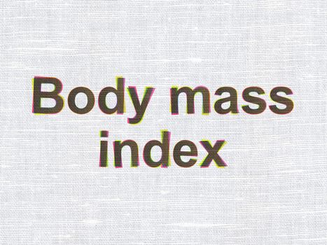 Healthcare concept: CMYK Body Mass Index on linen fabric texture background