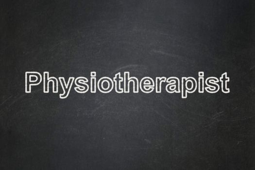 Healthcare concept: text Physiotherapist on Black chalkboard background