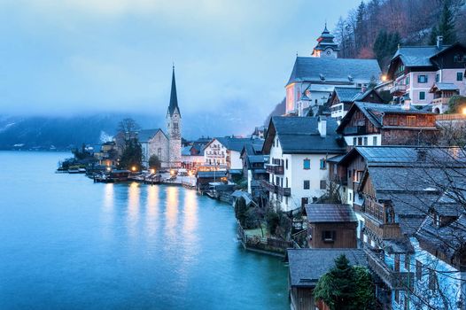 Hallstatt, Salzkammergut, Austria, in blue misty morning light. UNESCO World Culture Heritage site near Salzburg.