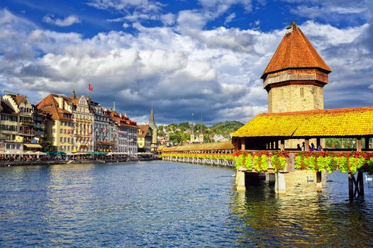 Lucerne, Switzerland, river and the old town with wooden Chapel Bridge and Water tower
