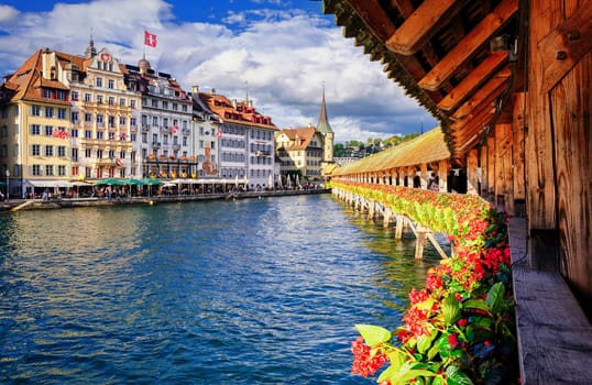 Lucerne, Switzerland, view from the famous wooden Chapel Bridge to the old town