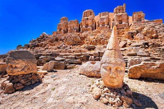 Antique statues on the top of Nemrut mountain at sunrise, Turkey