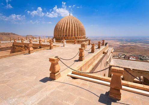 Dome of Zinciriye Medrese with mesopotamian valley in background, Mardin, south east Turkey