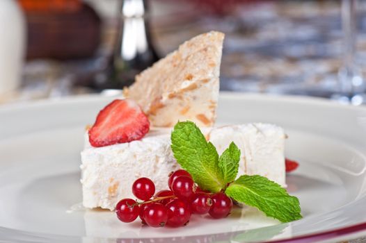 cream dessert with berries cranberries and strawberry