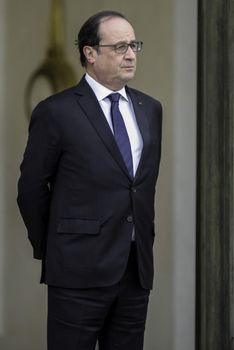 FRANCE, Paris: French President Francois Hollande waits for the arrival of US Secretary of State for their talks at the Elysee palace in Paris on November 17, 2015, four days after a spate of coordinated attacks in Paris that left at least 129 dead and over 350 injured late on November 13. US Secretary of State John Kerry arrived in Paris for talks after the attacks on the French capital, vowing to defeat terrorism.