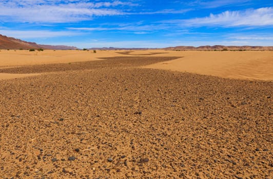 Beautiful Moroccan landscape, Sahara desert, stones against the sky