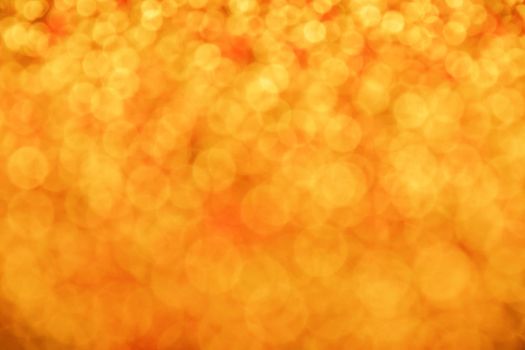 Golden red glitter bright magic light circles christmas abstract blur effect background