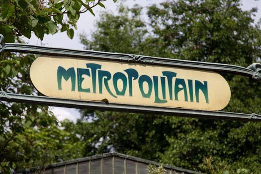 Ancient Metro Sign at the entrance of the Paris Metro