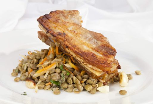 Baked Bacon with green and yellow lentil