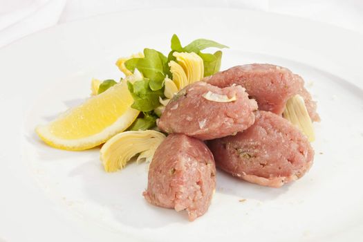 Veal steak tartar with caper and fresh artichoke