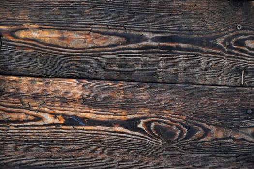 Old dark vintage rustic aged antique wooden sepia panel with horizontal gaps, planks and chinks