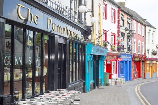pubs and retaurant fronts on a kilkenny city high street in ireland