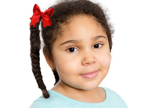 Close up Cute Young Girl with Braided Curly Hair Looking at You with Half Smile, Isolated on White Background.