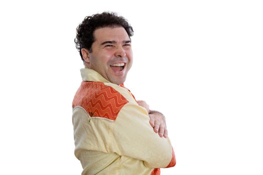 Half Body Shot of a Cheerful Middle Aged Man Wearing Trendy African Shirt Looking at the Camera Against White Background.