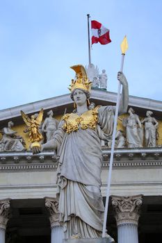 The Austrian Parliament and statue of Pallas Athena in Vienna, Austria