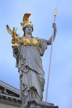 The Austrian Parliament and statue of Pallas Athena in Vienna, Austria