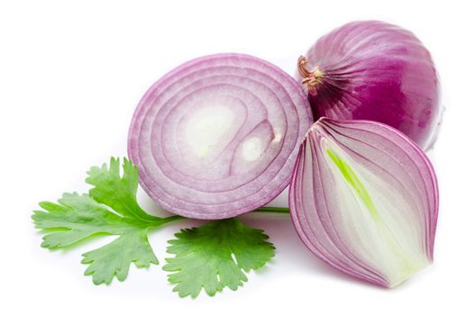 Sliced red onion with parsley isolated on the white background.