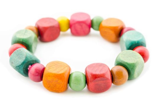 colorful wooden beads bracelet isolated on white background.