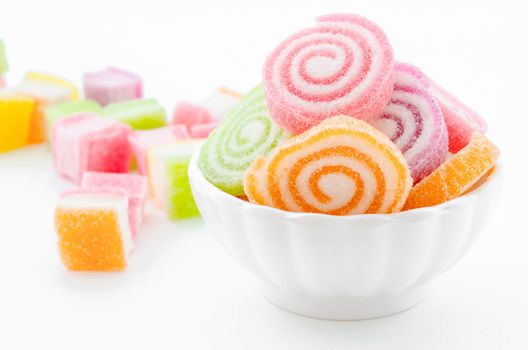 Jelly sweet, flavor fruit, candy dessert colorful in white cupl on white background.