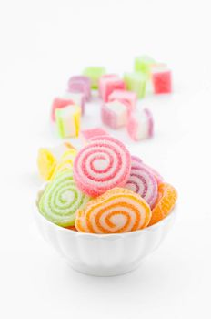 Jelly sweet, flavor fruit, candy dessert colorful in white cupl on white background.