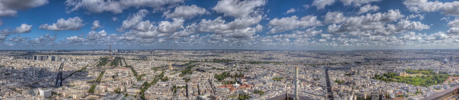 Wide panorama of Paris cityscape with all major landmarks, shot from the top of Montparnasse Tower on sunny summer day