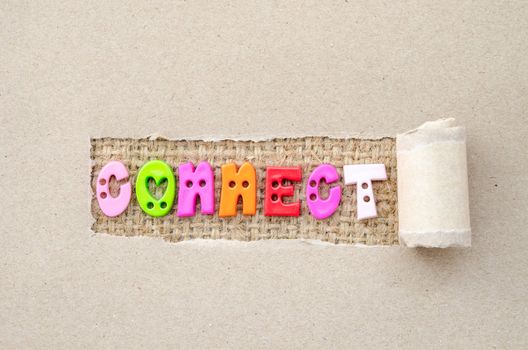 Connect concept. Connect alphabet colorful on sack background in shredded paper