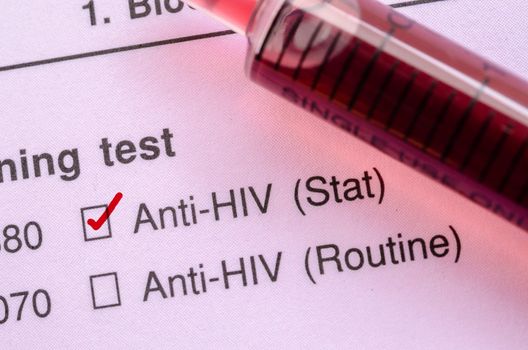 Red correct check mark with blood sample in syringe for HIV test form request.