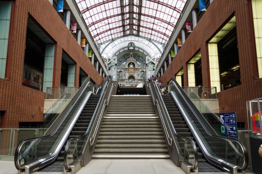 Antwerp, Belgium - May 11, 2015: Passengers in Main hall of Antwerp Central station on May 11, 2015 in Antwerp, Belgium. The station is now widely regarded as the finest example of railway architecture in Belgium.